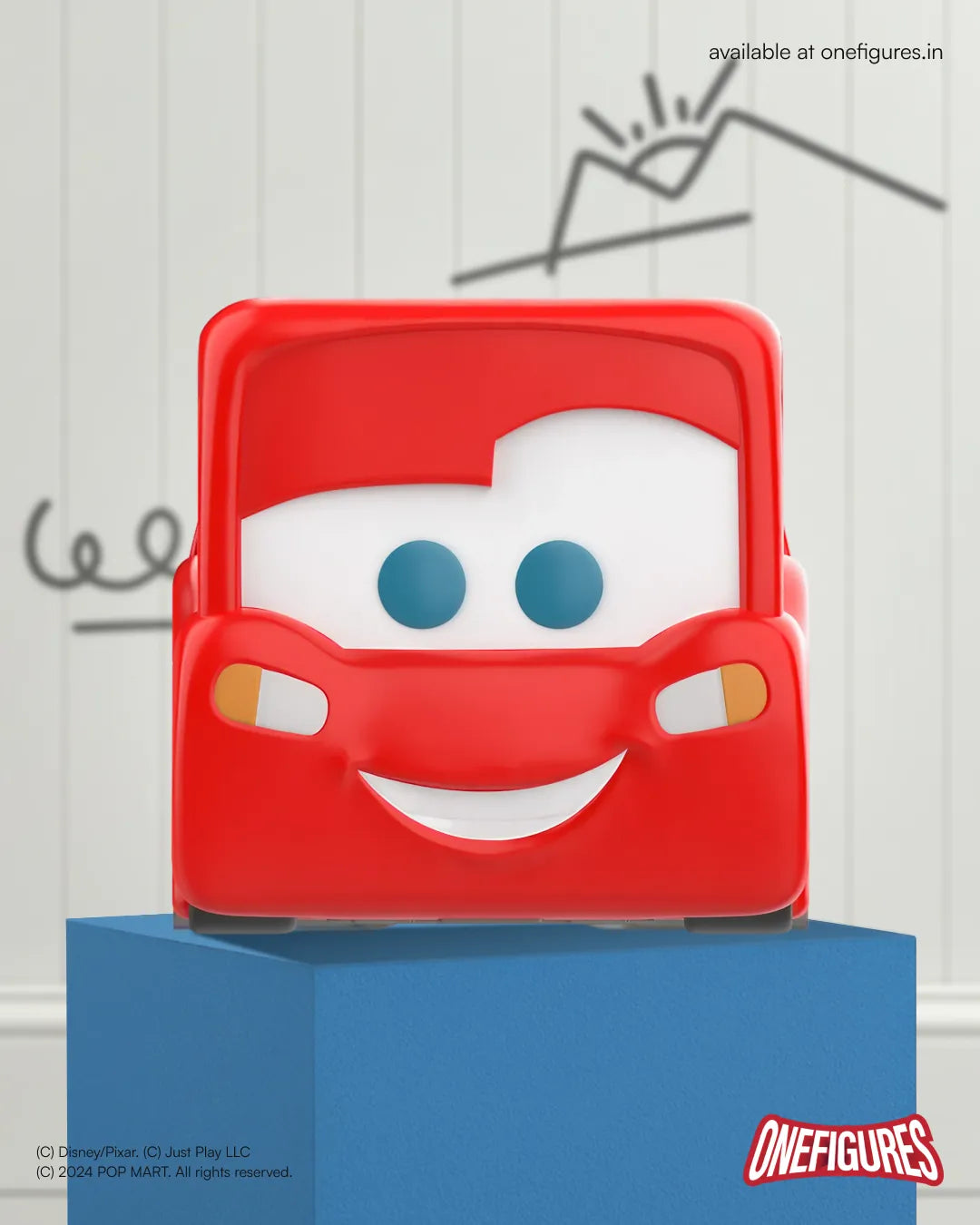Lightning McQueen with a smiling face on a blue stand against a white background
